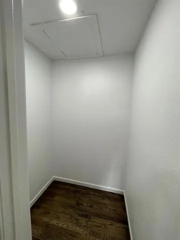 a view of room with hardwood floor