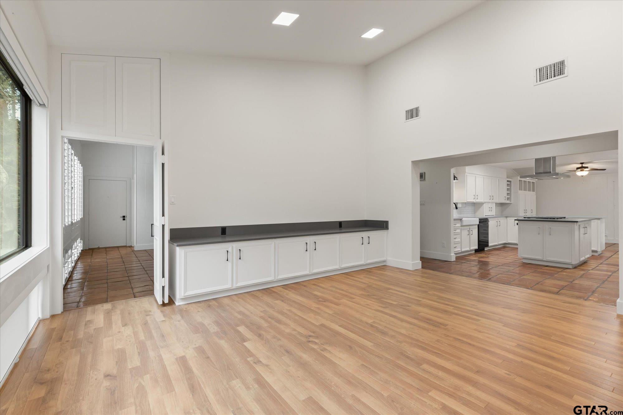 6376 Tryon Road Longview, TX 75605 - Photo 18 of 43 a view of empty room with wooden floor