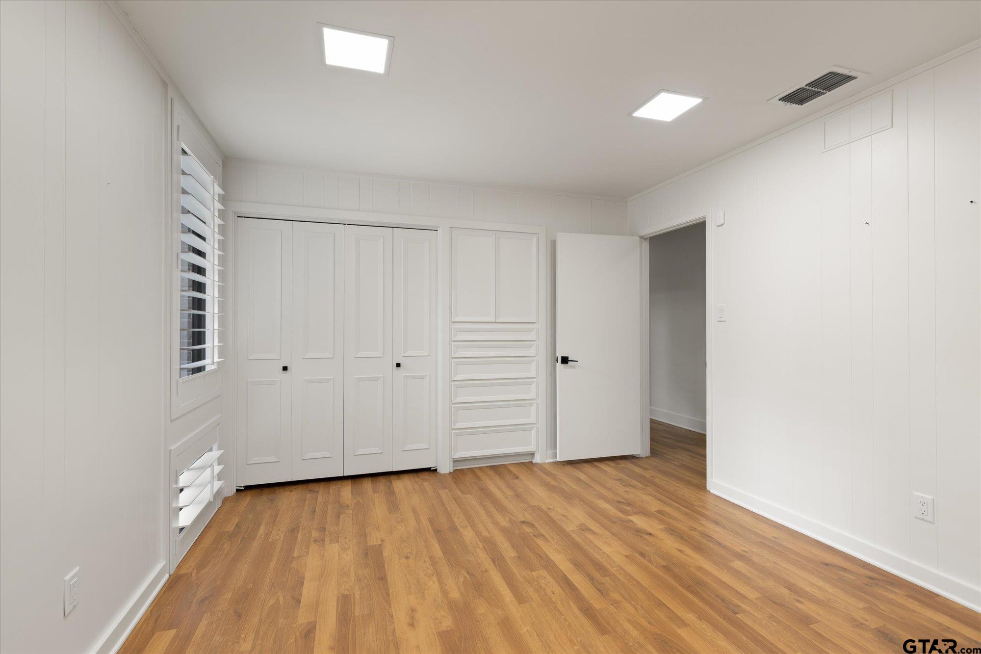 6376 Tryon Road Longview, TX 75605 - Photo 28 of 43 a view of an empty room and wooden floor