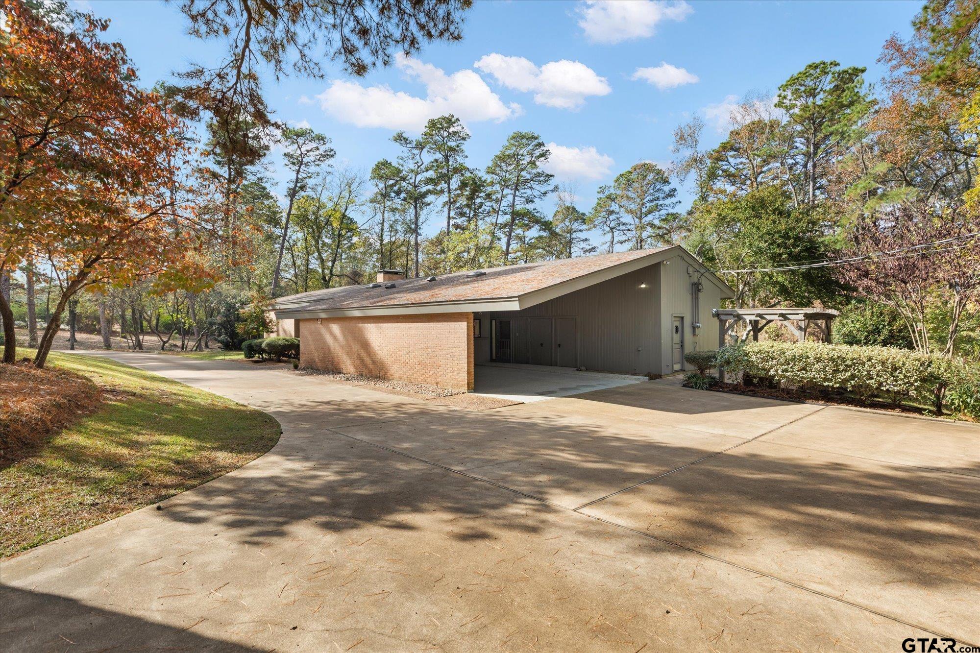 6376 Tryon Road Longview, TX 75605 - Photo 34 of 43 a view of back yard of the house
