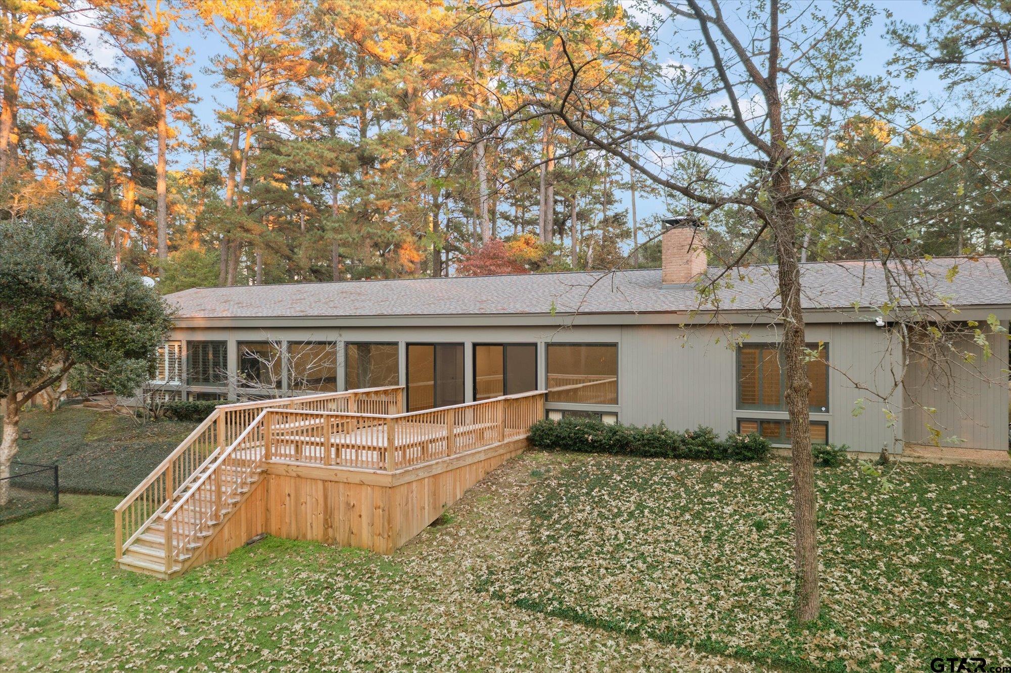 6376 Tryon Road Longview, TX 75605 - Photo 40 of 43 a front view of house with yard and trees around