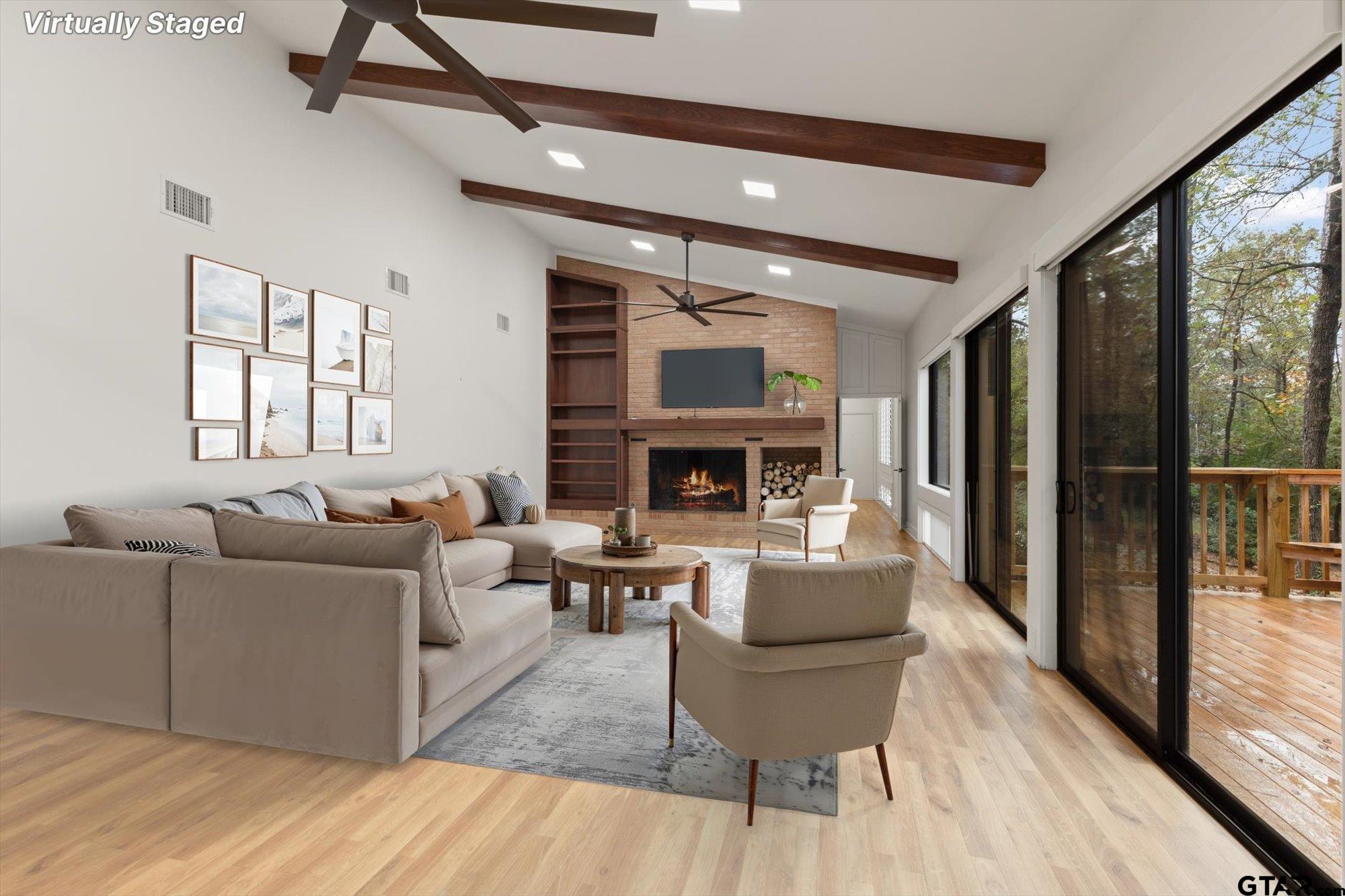 6376 Tryon Road Longview, TX 75605 - Photo 7 of 43 a living room with fireplace furniture and a large window