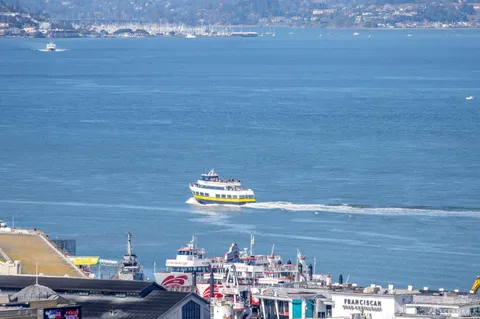 a view of a city with ocean