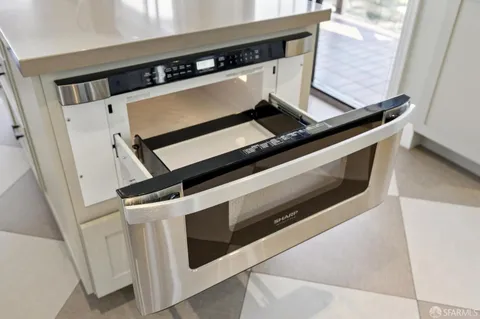 a bedroom with a bed and a table