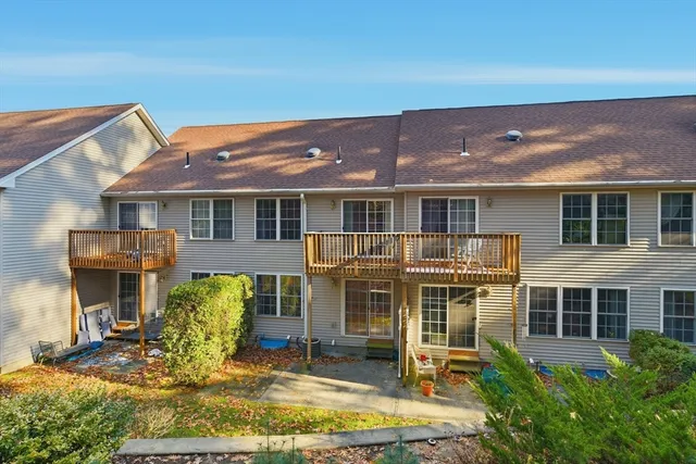 a view of a street with a building in the background