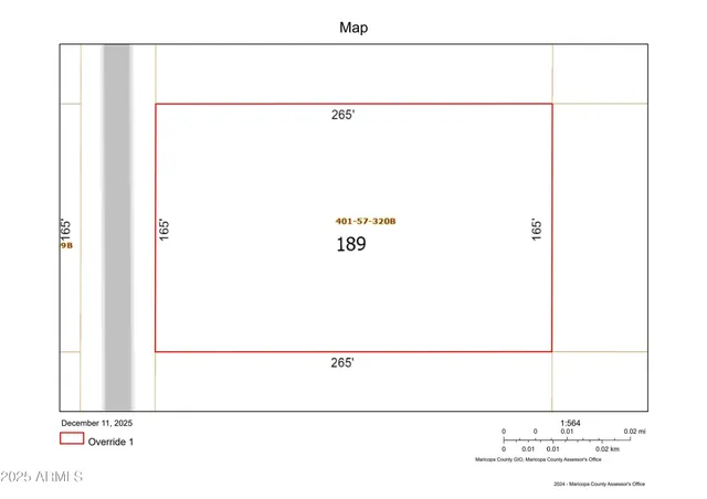 a picture of a room with a white wall and a refrigerator