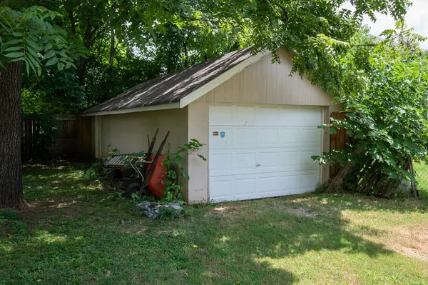 a view of a yard with an outdoor space and seating area