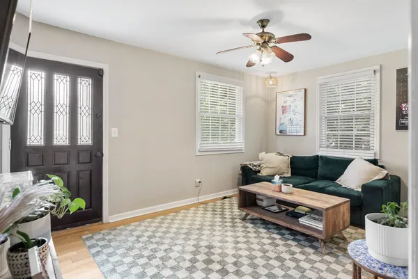 a living room with furniture and window