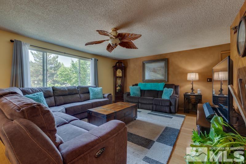2617 Rayma Court Reno, NV 89503 - Photo 2 of 20 a living room with furniture and a large window