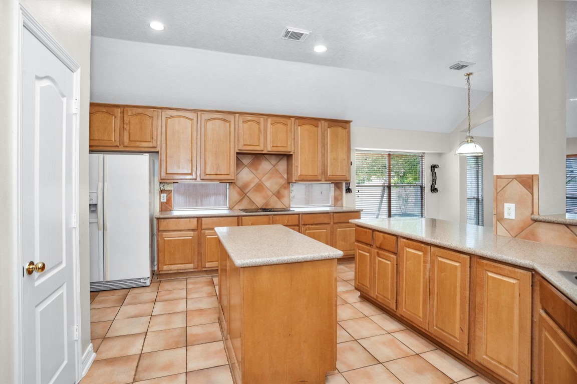 5307 Summerland Ridge Court Houston, TX 77041 - Photo 13 of 35 Central island kitchen