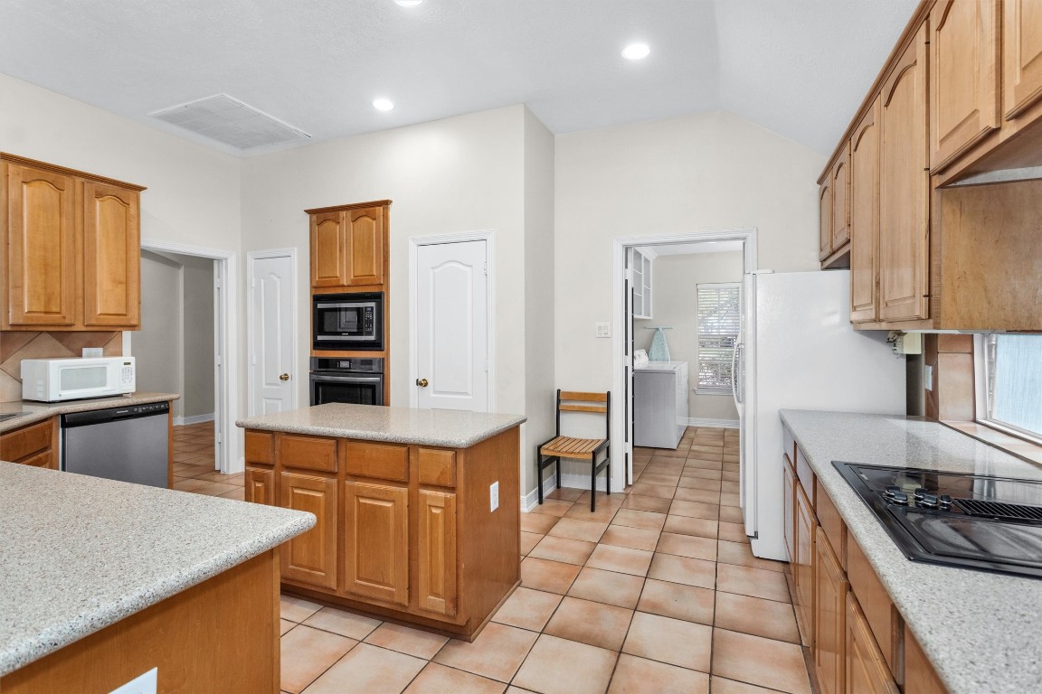 5307 Summerland Ridge Court Houston, TX 77041 - Photo 15 of 35 Quartz counters with 2 pantries
