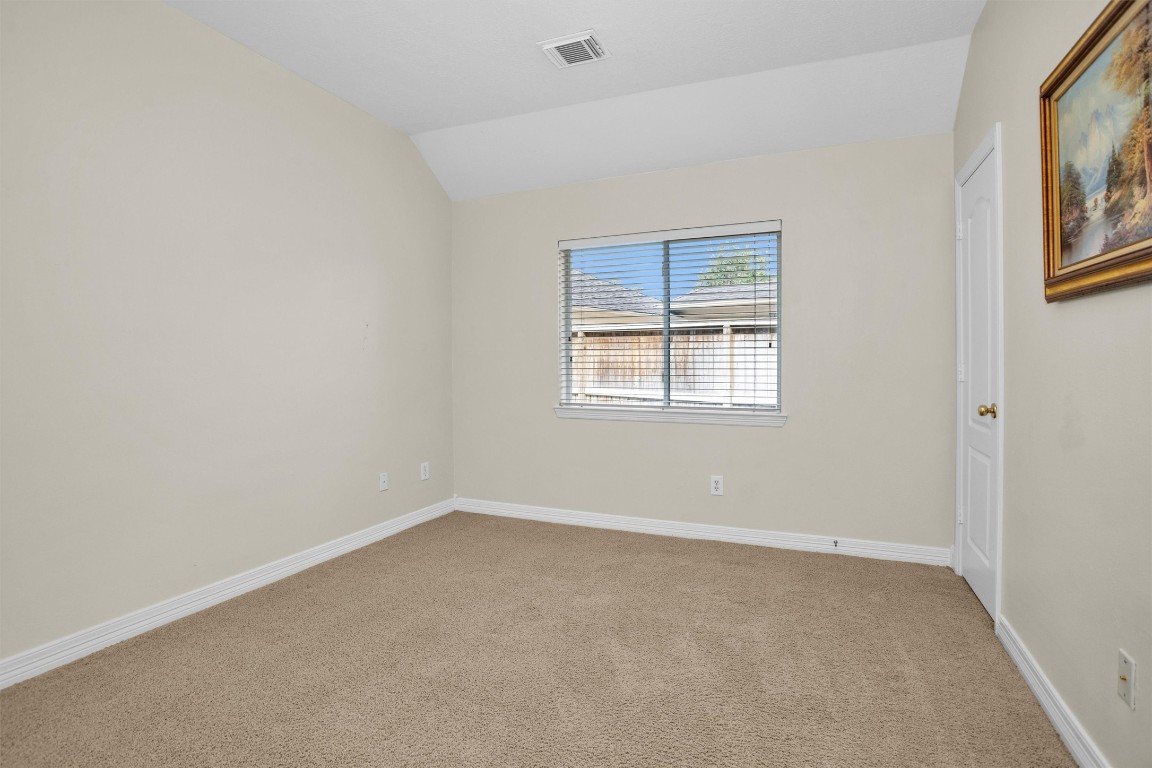 5307 Summerland Ridge Court Houston, TX 77041 - Photo 25 of 35 2nd bedroom. All bedrooms are carpeted