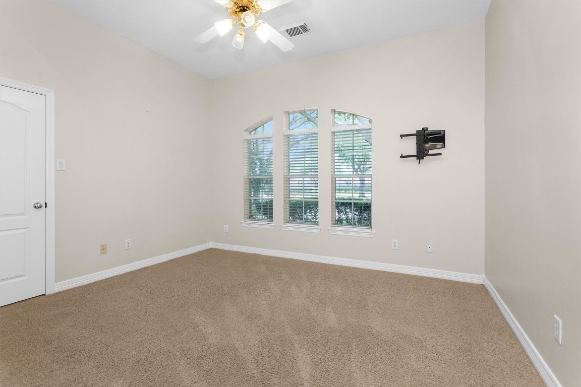 5307 Summerland Ridge Court Houston, TX 77041 - Photo 29 of 35 4th bedroom. Carpeted with ceiling fan and TV mount