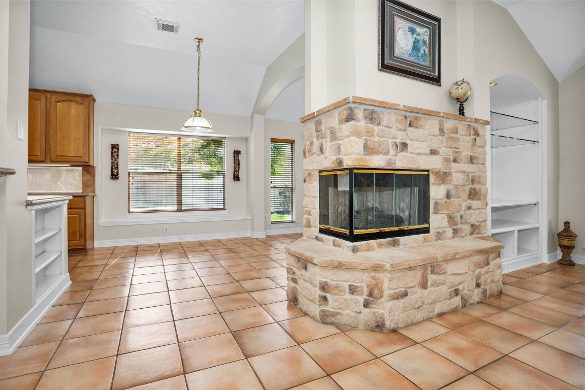 5307 Summerland Ridge Court Houston, TX 77041 - Photo 8 of 35 Beautiful central stone fireplace