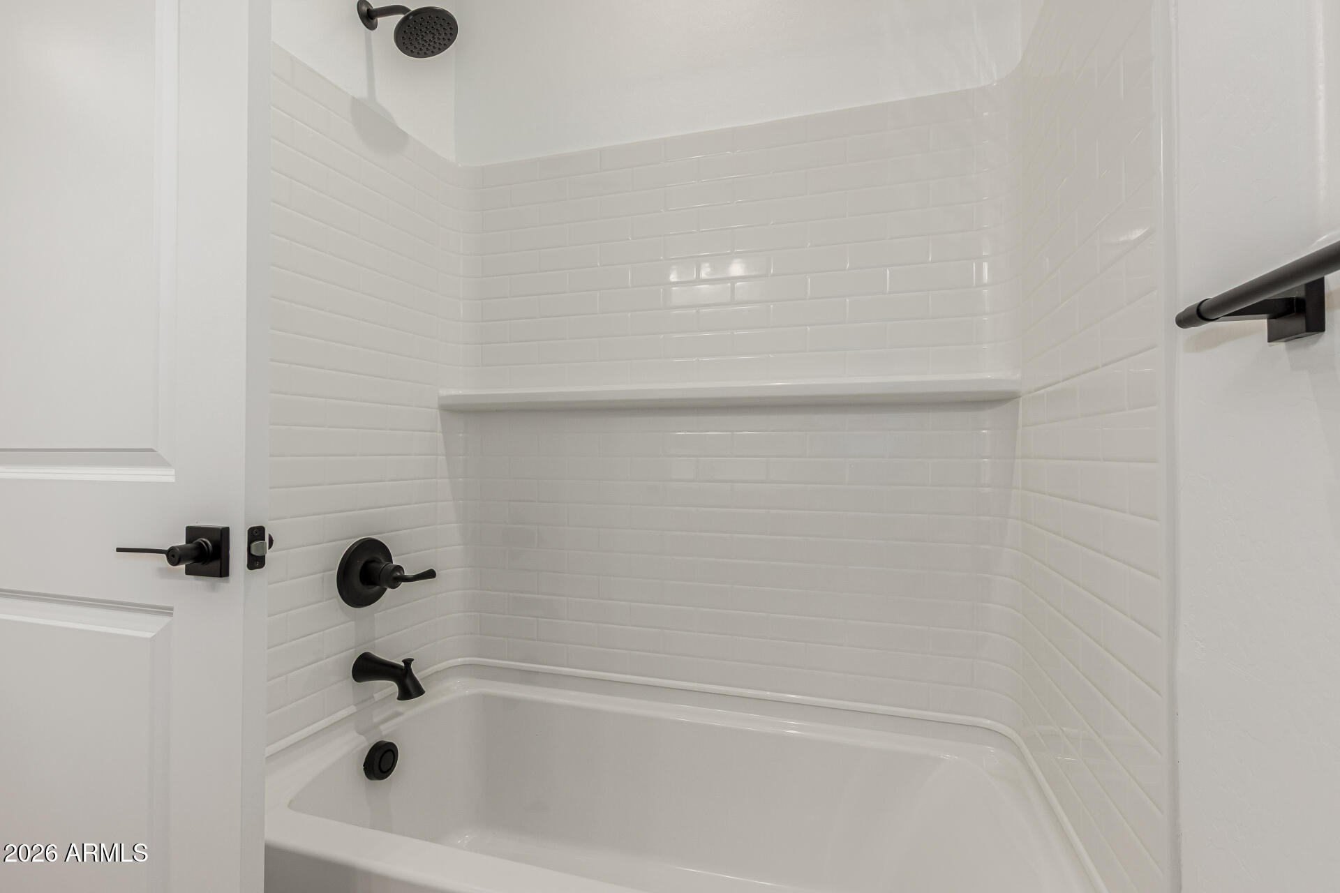 8029 West Granada Road Phoenix, AZ 85035 - Photo 12 of 35 a bathroom with a tub