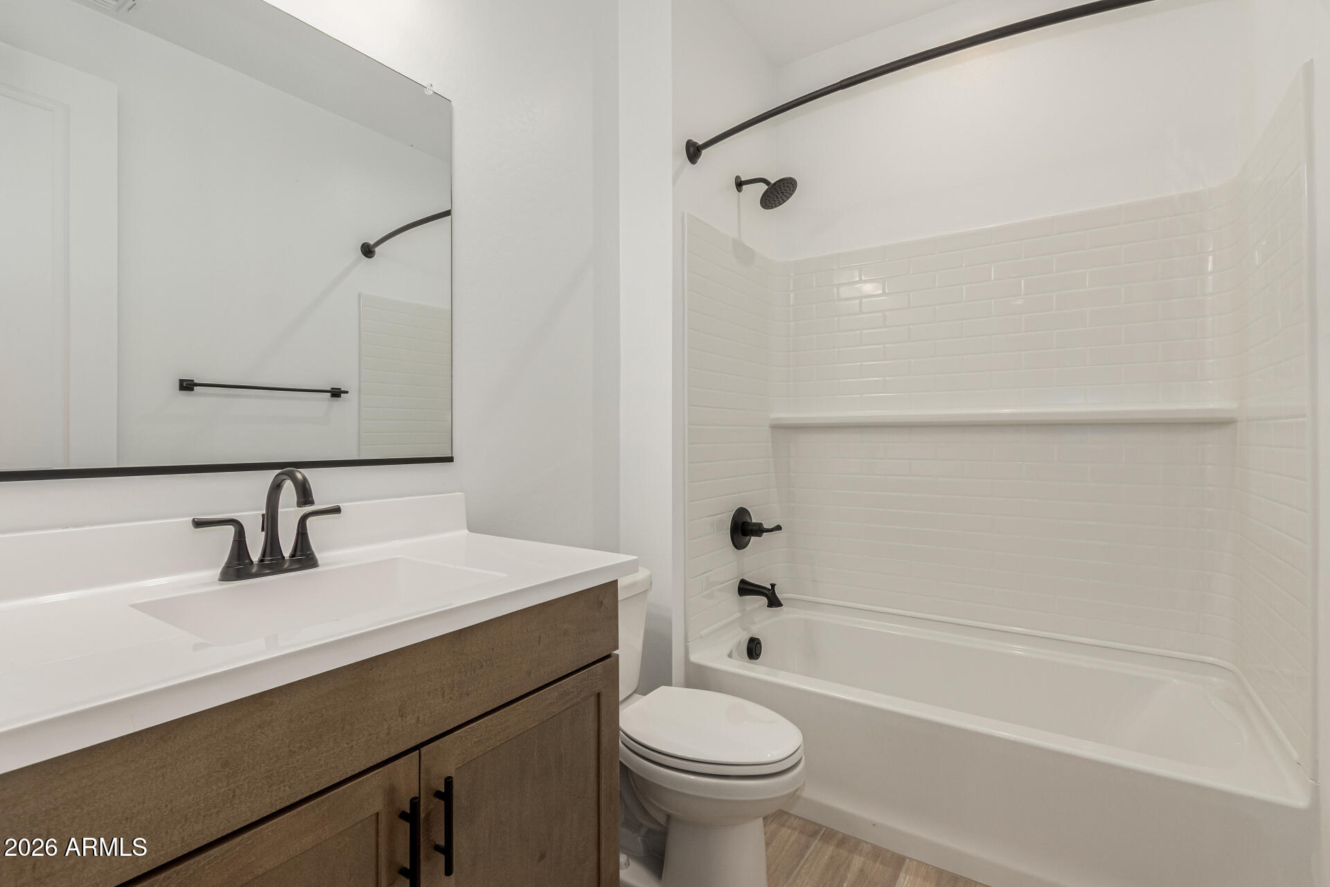 8029 West Granada Road Phoenix, AZ 85035 - Photo 18 of 35 a bathroom with a sink a toilet and shower