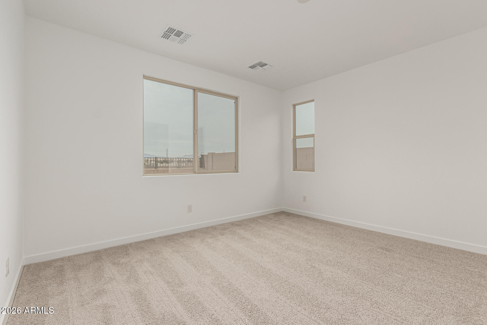 8029 West Granada Road Phoenix, AZ 85035 - Photo 19 of 35 a view of an empty room with a window