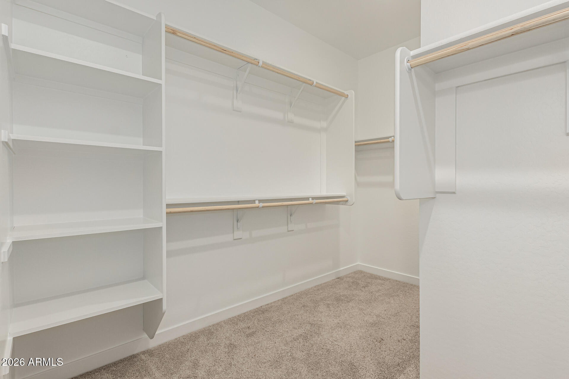 8029 West Granada Road Phoenix, AZ 85035 - Photo 22 of 35 a view of an empty walk in closet