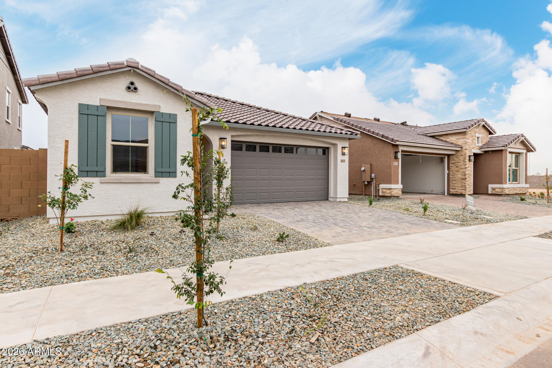 8029 West Granada Road Phoenix, AZ 85035 - Photo 30 of 35 a front view of a house with garden