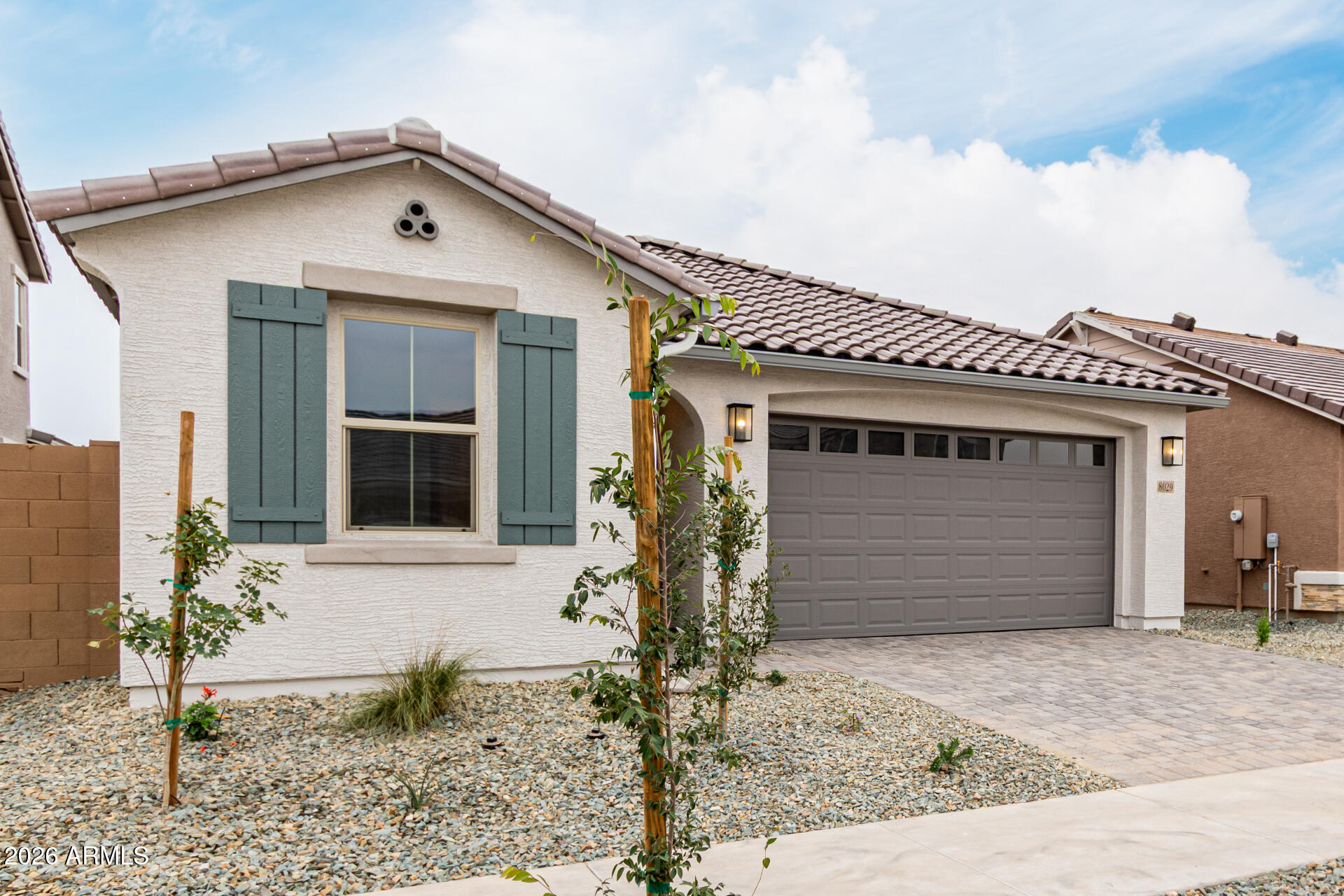 8029 West Granada Road Phoenix, AZ 85035 - Photo 33 of 35 a front view of a house with garden