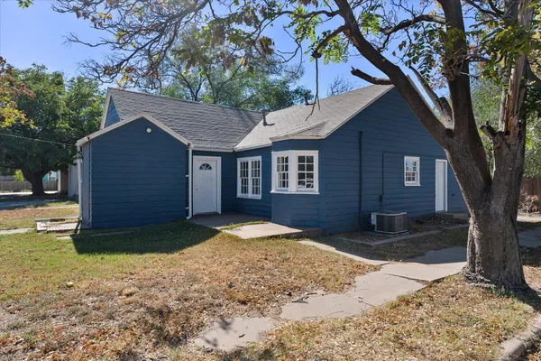 a house view with a outdoor space