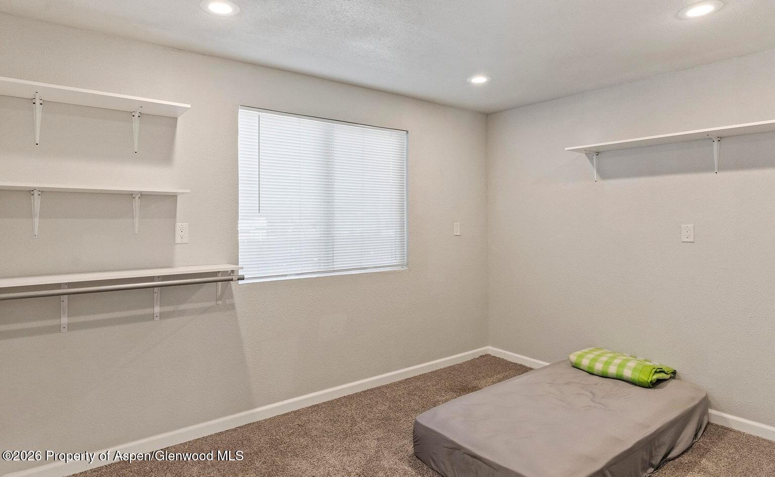 525 Colorado Street, Unit B Craig, CO 81625 - Photo 7 of 10 a workspace with furniture and window