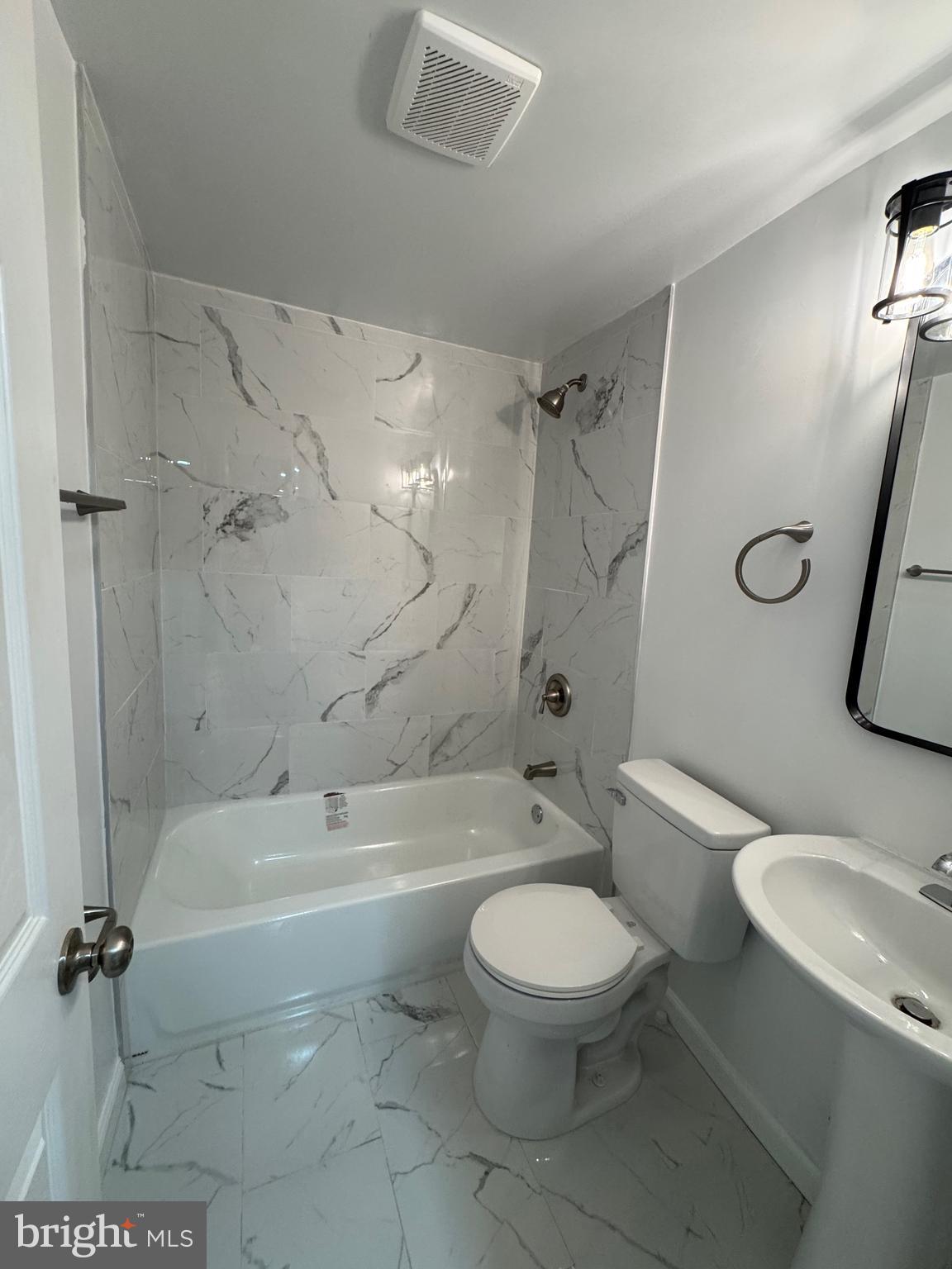 1202 Barnaby Terrace Southeast Washington, DC 20032 - Photo 12 of 21 a bathroom with a toilet and a shower