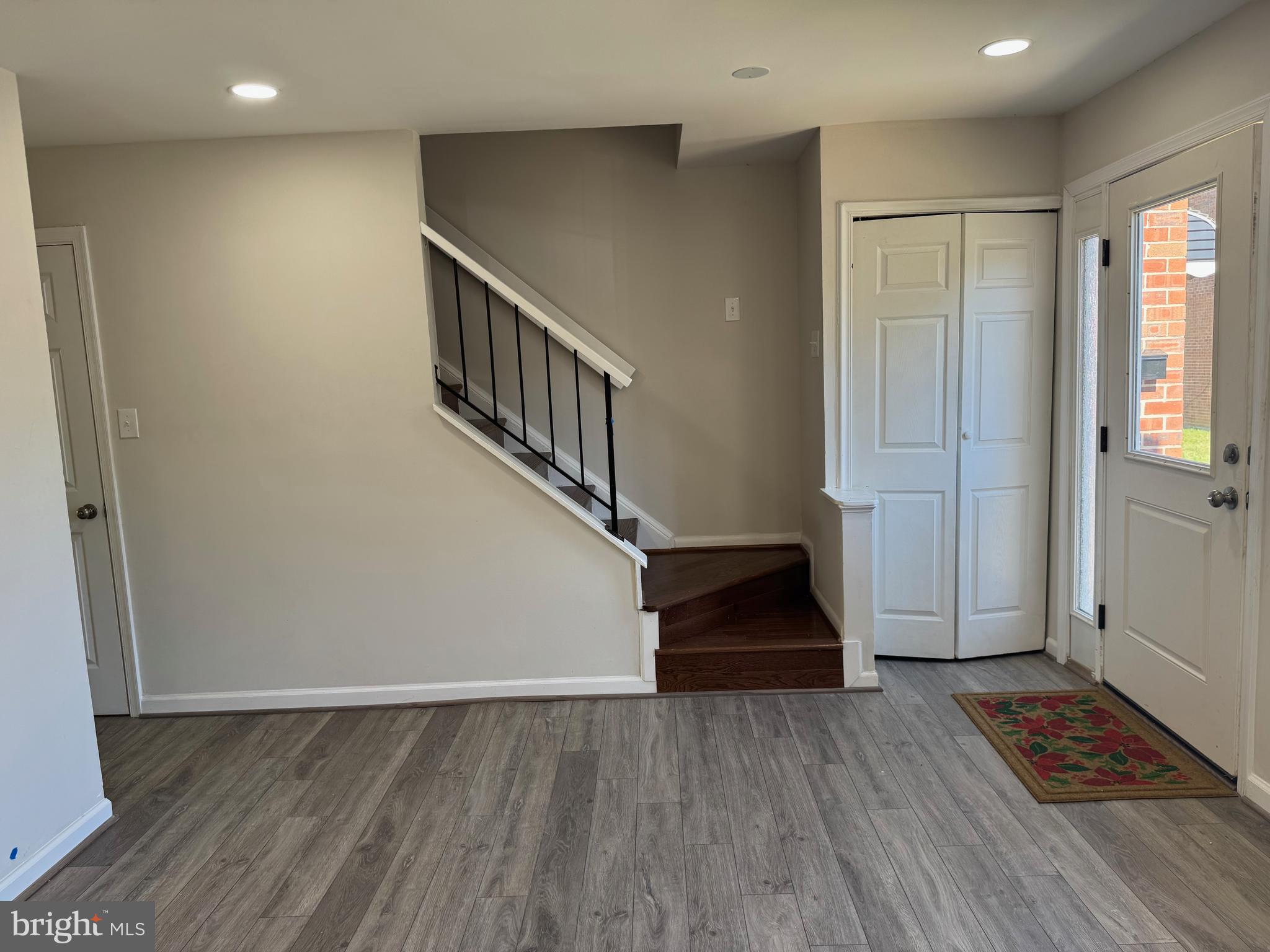 1202 Barnaby Terrace Southeast Washington, DC 20032 - Photo 6 of 21 a view of entryway with wooden floor