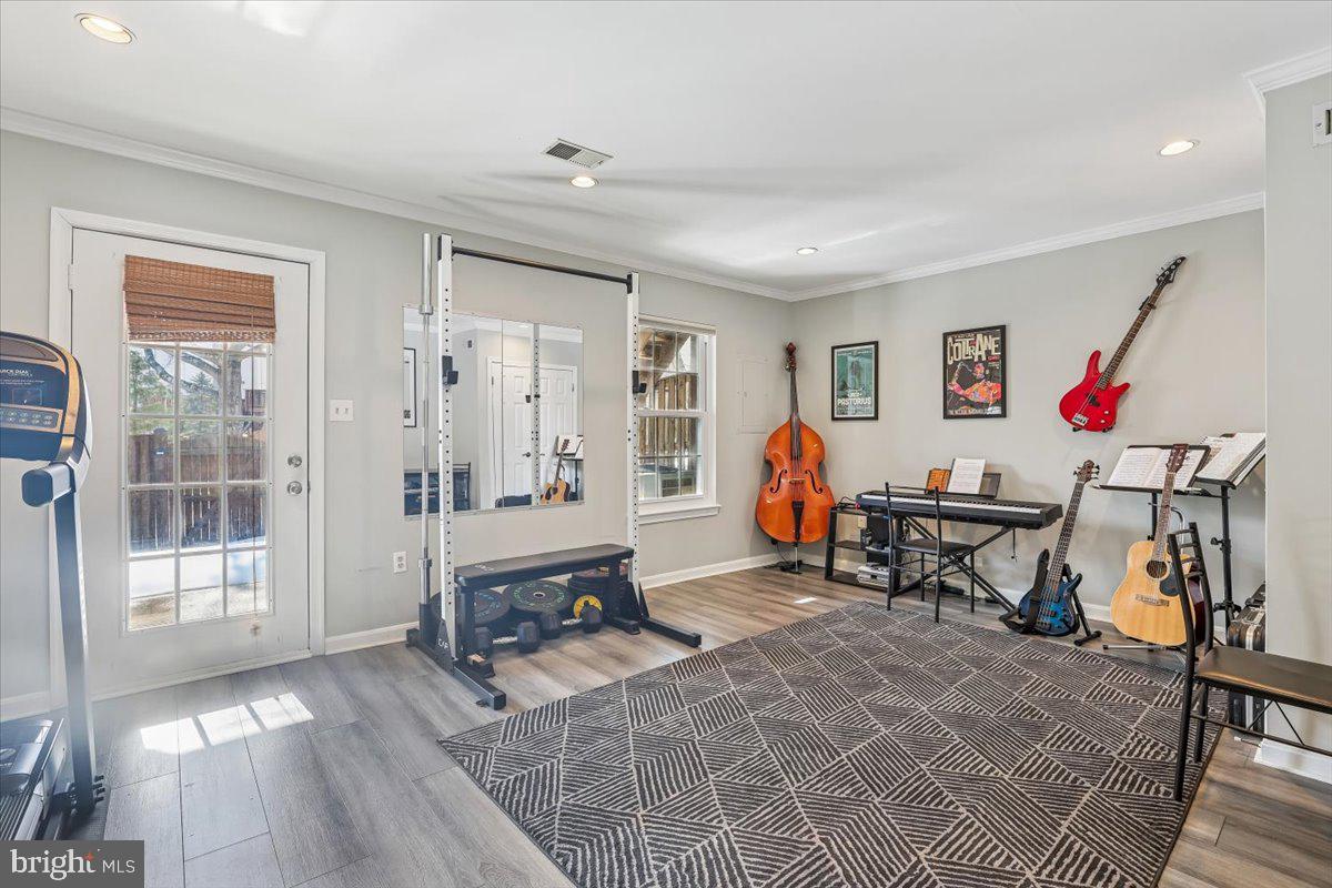 6047 Knights Ridge Way Alexandria, VA 22310 - Photo 17 of 33 Finished Family Room walk out to Back patio