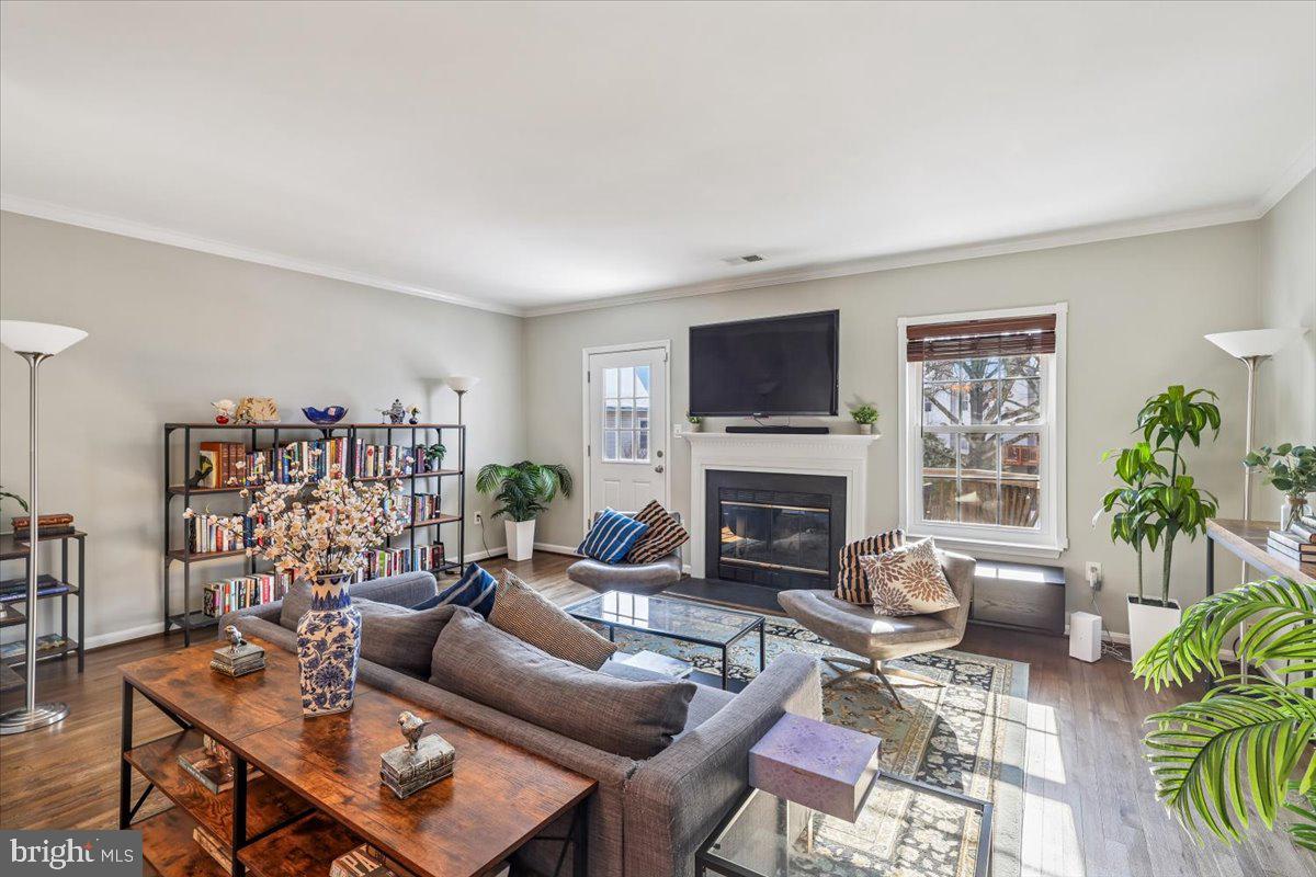 6047 Knights Ridge Way Alexandria, VA 22310 - Photo 2 of 33 Living Room, fireplace, hardwood Floors