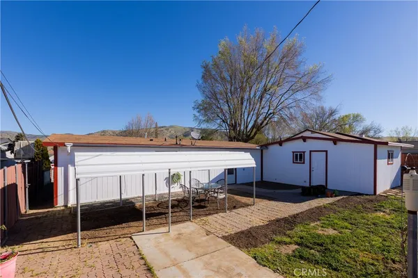 a view of a house with a patio