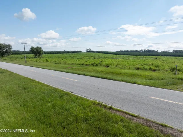 a view of swimming pool with a balcony