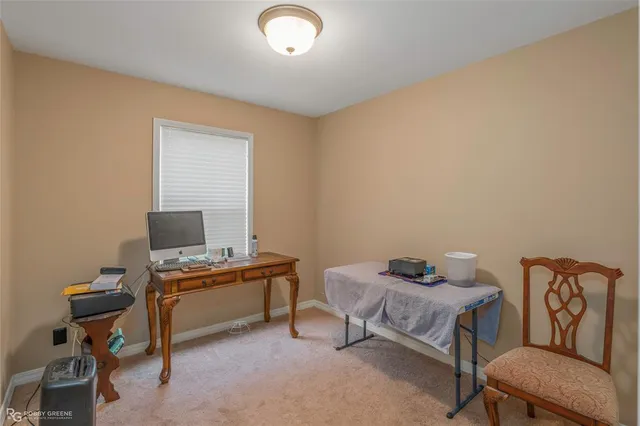 a workspace with furniture and lamp