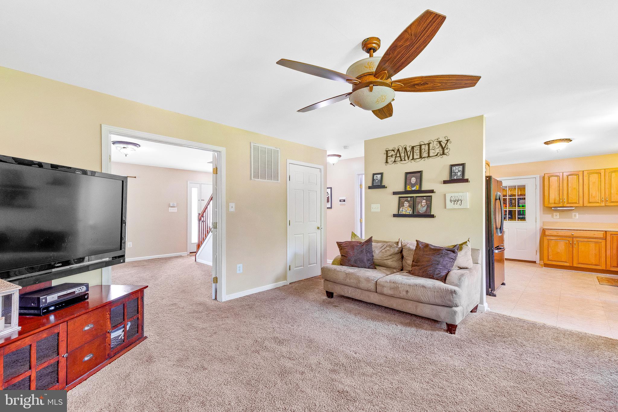 1389 Ball Road Port Republic, MD 20676 - Photo 11 of 56 View from family room into living room and kitchen
