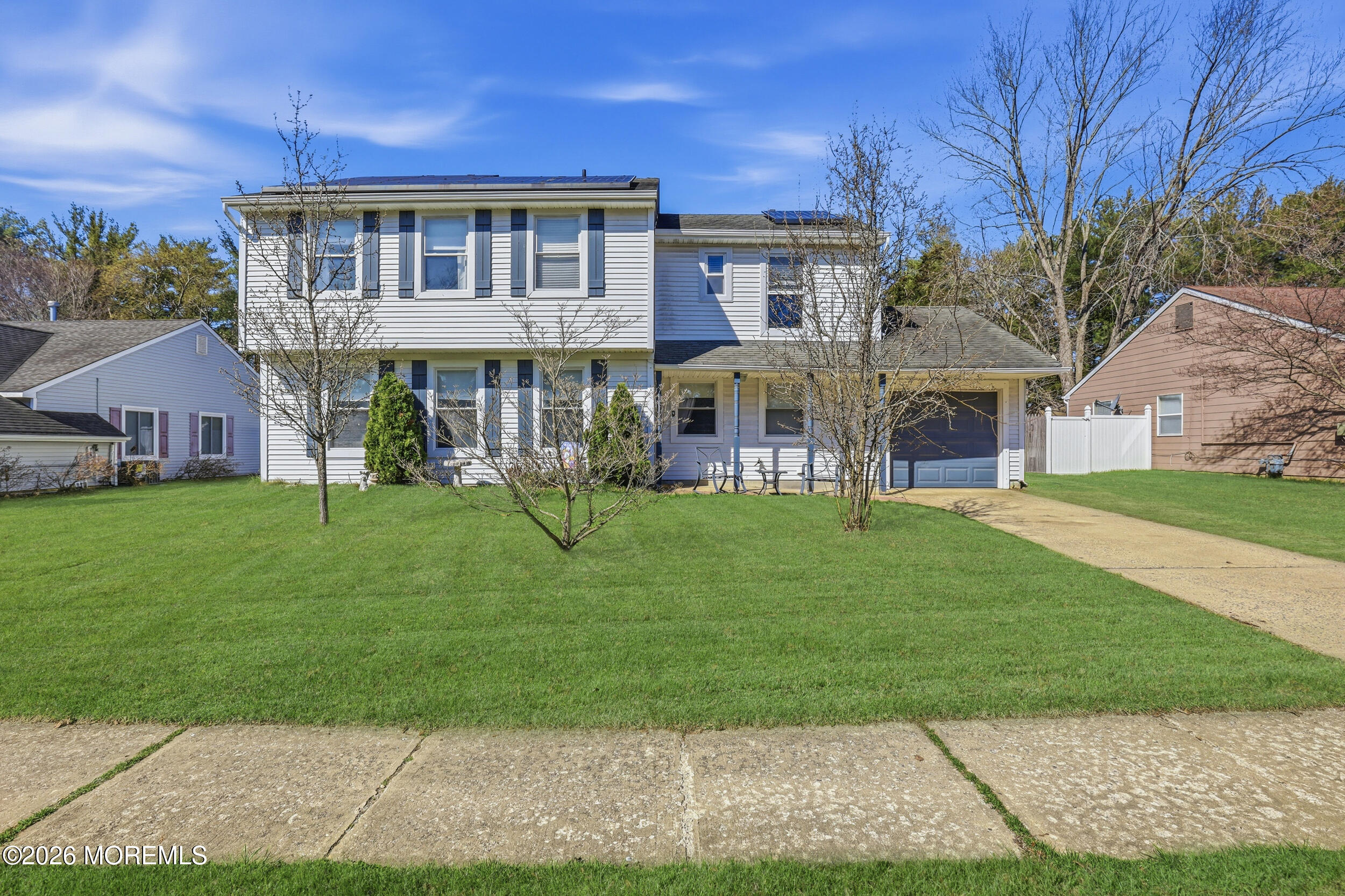 306 Ashford Road Toms River, NJ 08755 - Photo 1 of 33 a view of a house with a yard