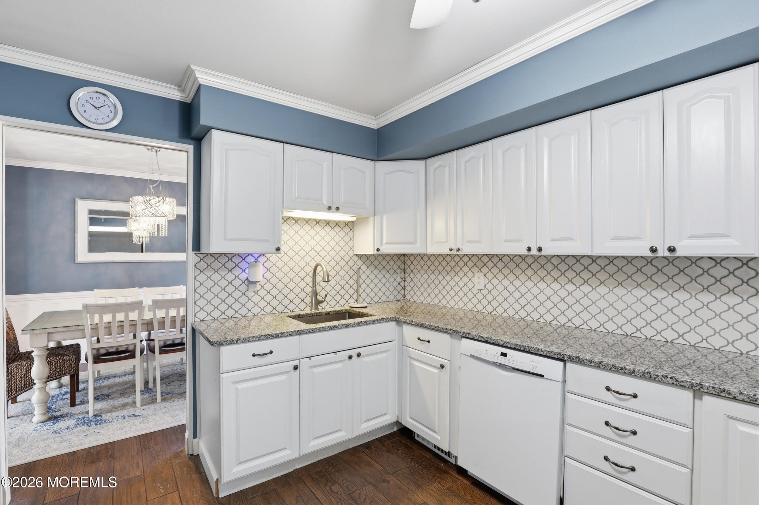 306 Ashford Road Toms River, NJ 08755 - Photo 11 of 33 a kitchen with granite countertop white cabinets and white appliances