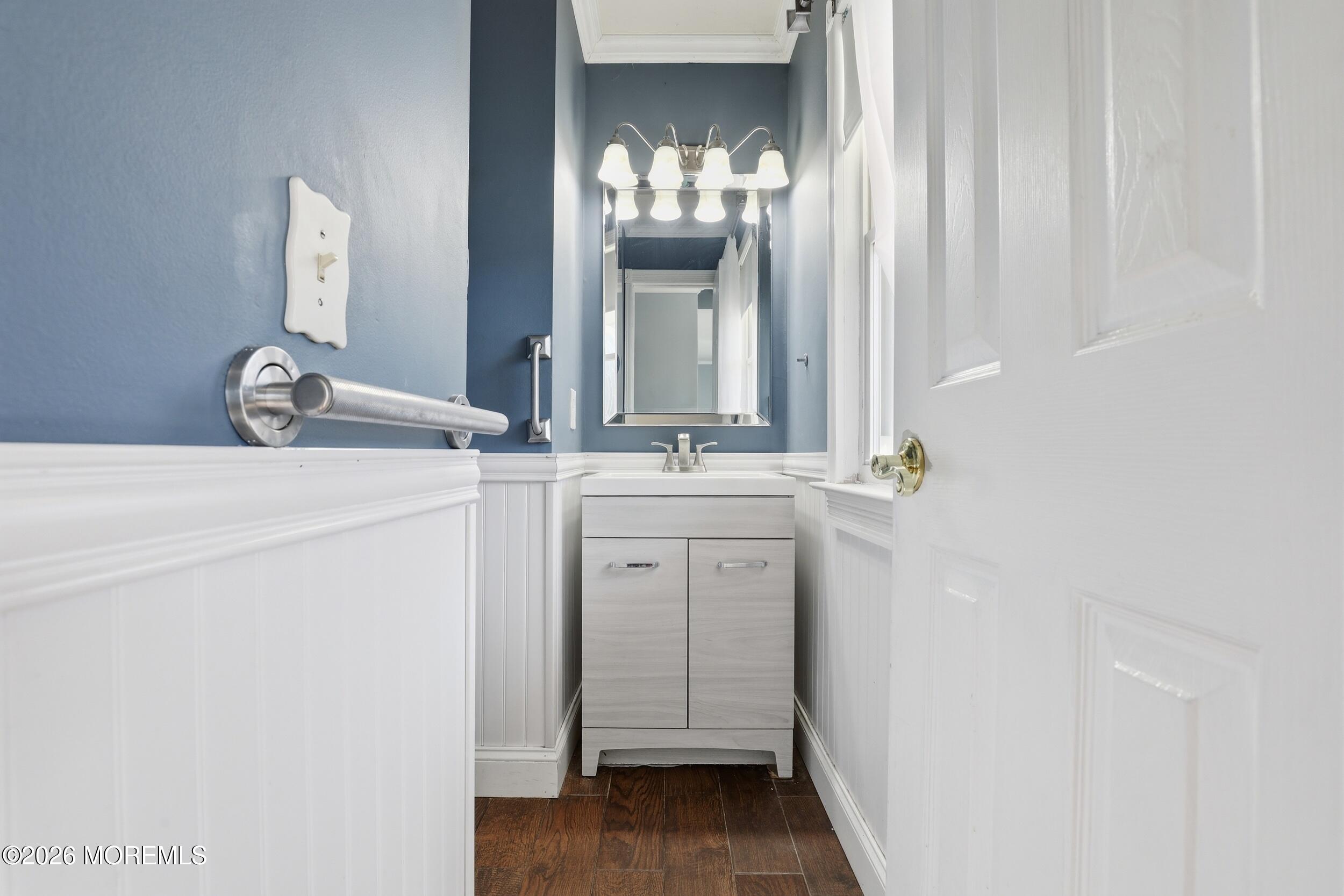 306 Ashford Road Toms River, NJ 08755 - Photo 16 of 33 a bathroom with a sink and a mirror