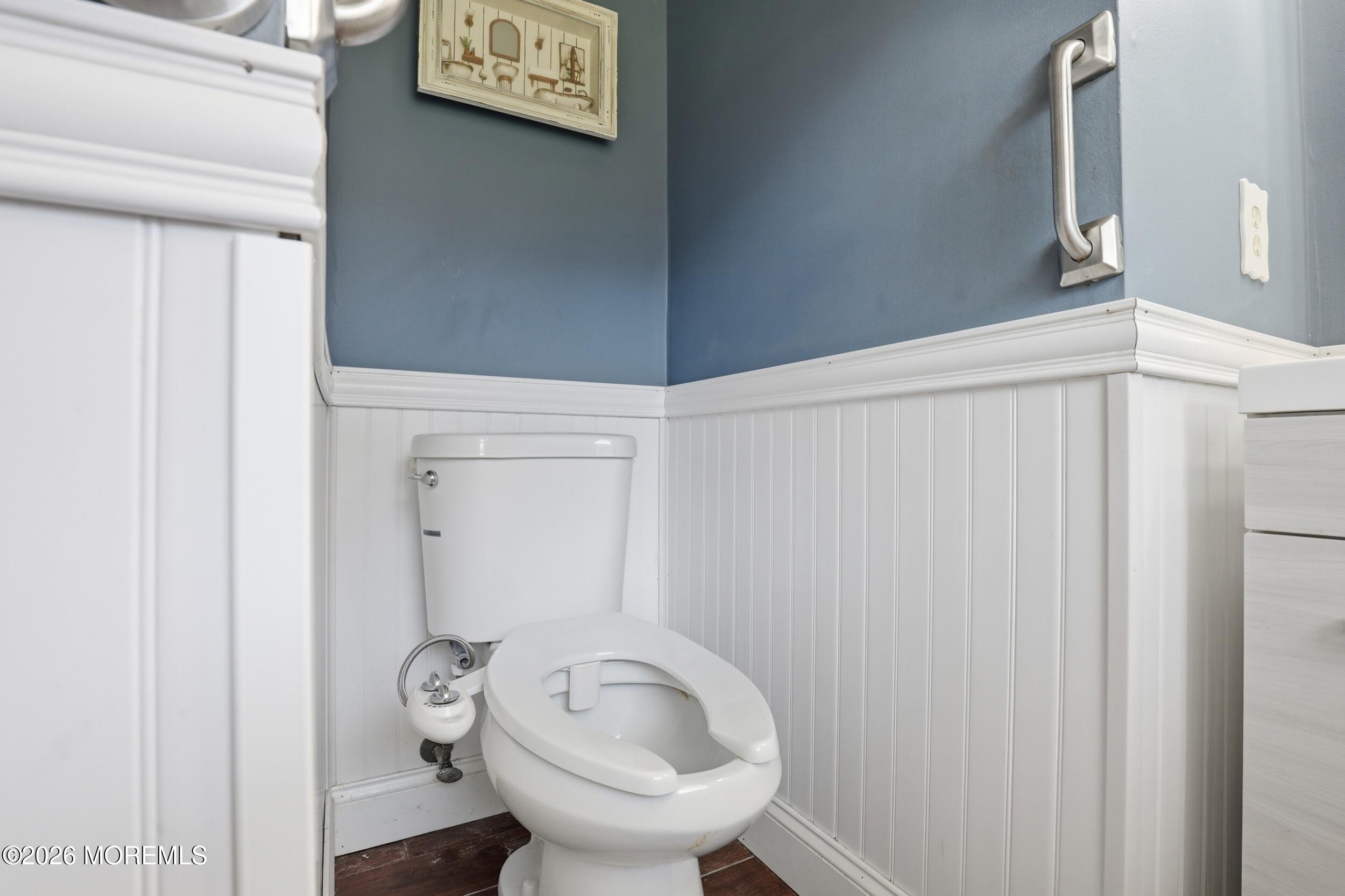 306 Ashford Road Toms River, NJ 08755 - Photo 17 of 33 a bathroom with a toilet and a sink