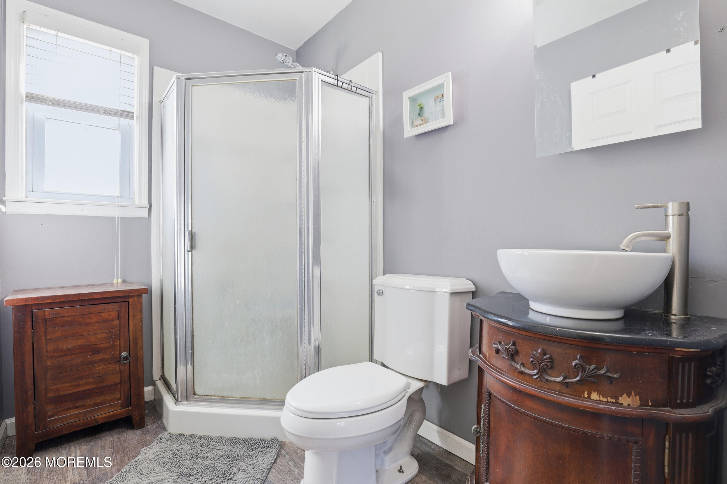 306 Ashford Road Toms River, NJ 08755 - Photo 19 of 33 a bathroom with a toilet a sink and a shower