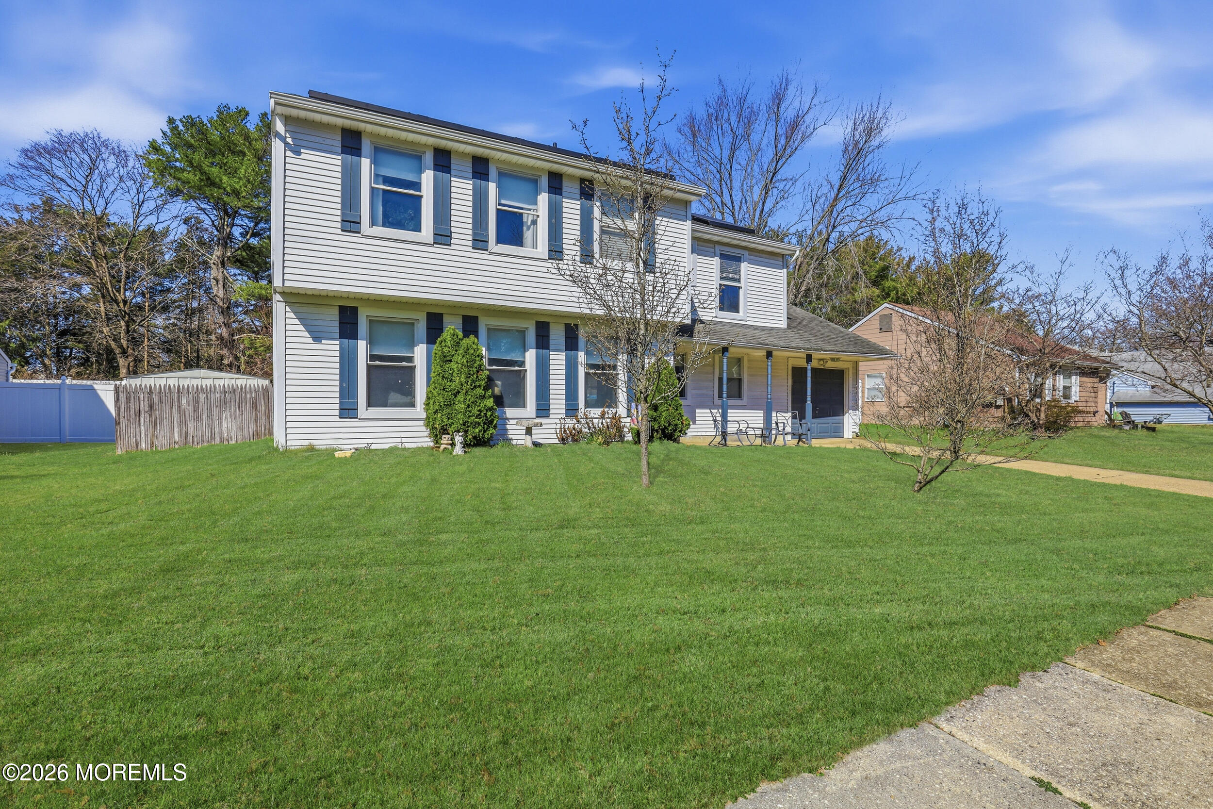 306 Ashford Road Toms River, NJ 08755 - Photo 2 of 33 a front view of house with yard and green space