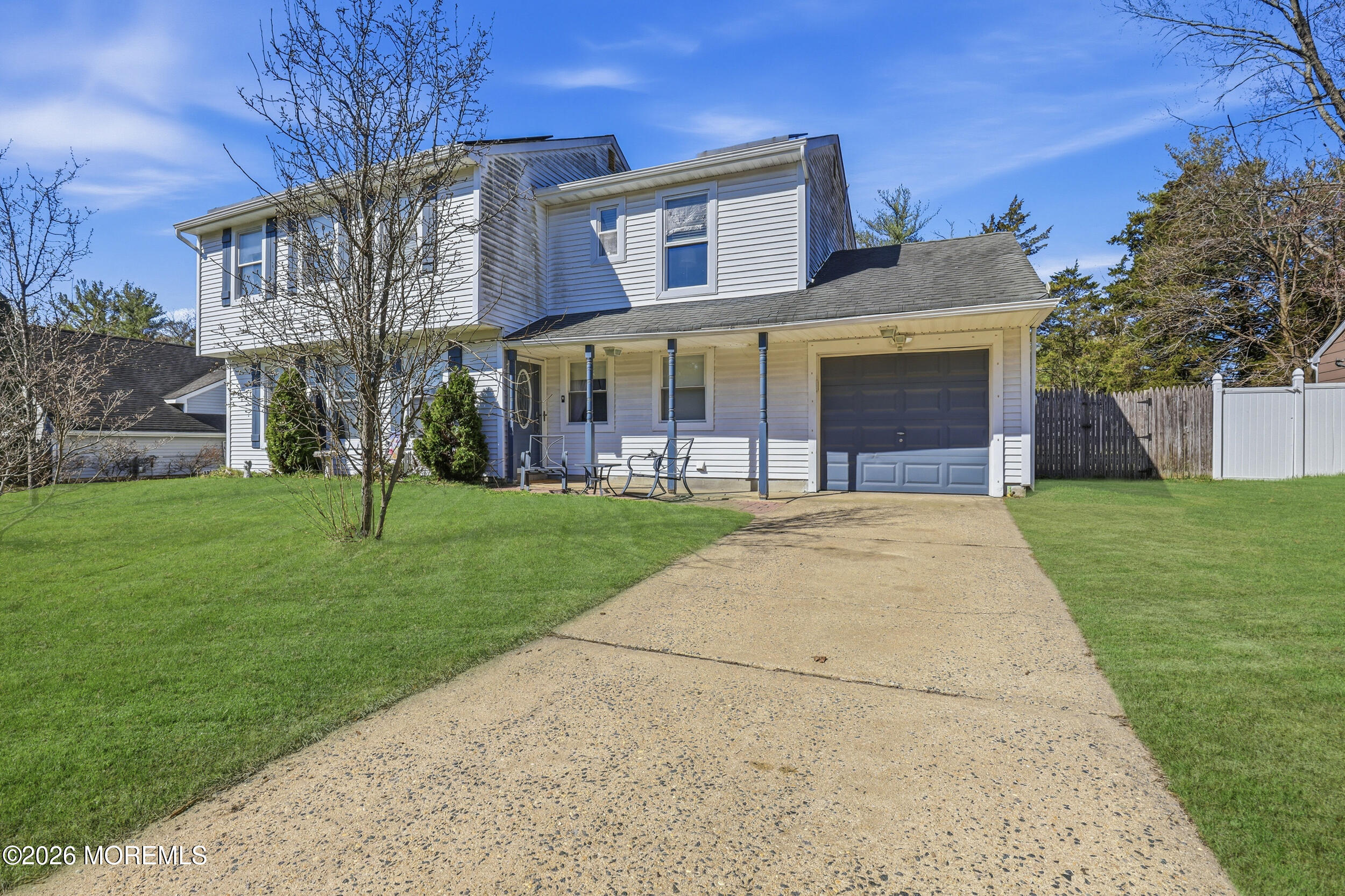 306 Ashford Road Toms River, NJ 08755 - Photo 3 of 33 a view of a building with a yard