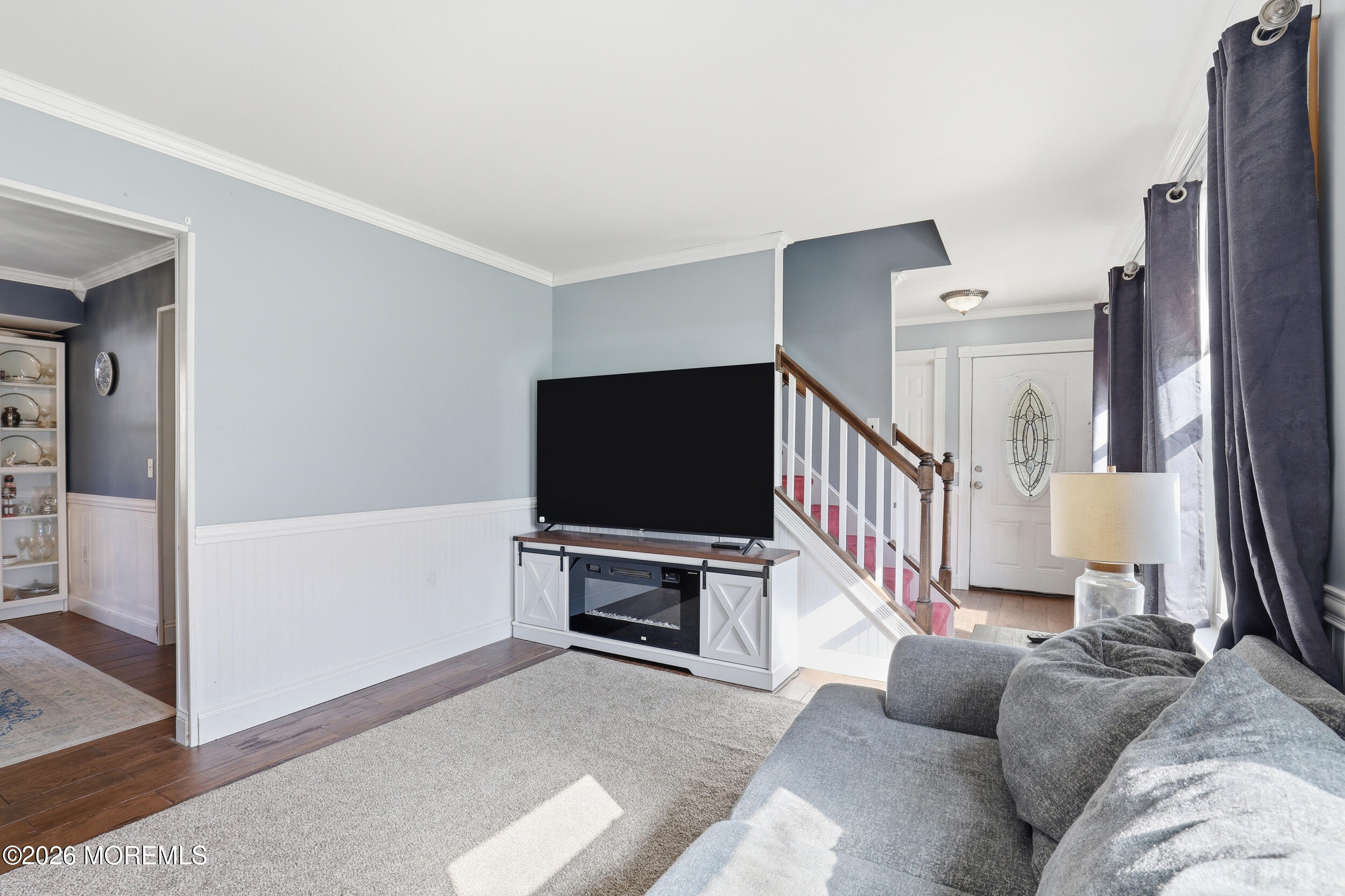 306 Ashford Road Toms River, NJ 08755 - Photo 8 of 33 a living room with furniture and a flat screen tv