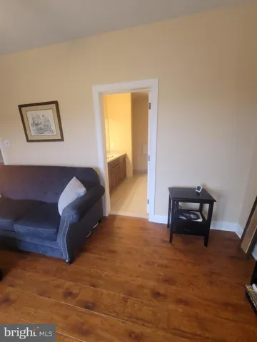 a bathroom with a sink a mirror and a shower