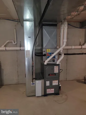 a view of a grassy field with an trees