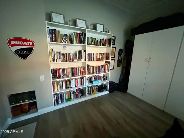 a view of an empty room with shelves
