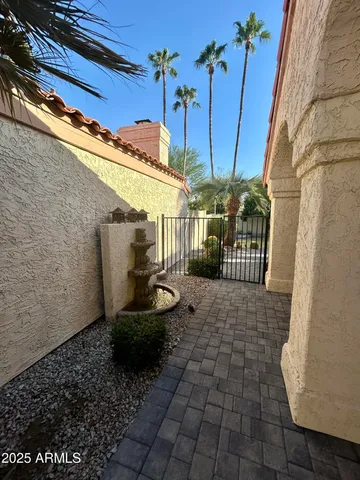a view of a porch with a floor to ceiling window
