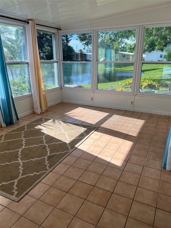 1001 Starkey Road, Unit 177 Largo, FL 33771 - Photo 17 of 44 a view of a garden from a windows