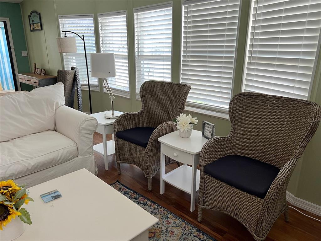 1001 Starkey Road, Unit 177 Largo, FL 33771 - Photo 22 of 44 a living room with furniture and a window