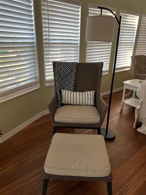 1001 Starkey Road, Unit 177 Largo, FL 33771 - Photo 26 of 44 a bed sitting in a bedroom next to a window