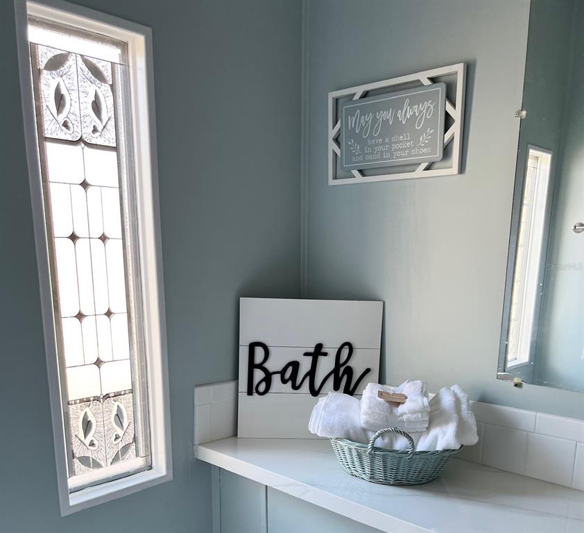 1001 Starkey Road, Unit 177 Largo, FL 33771 - Photo 32 of 44 a bed room with furniture and window